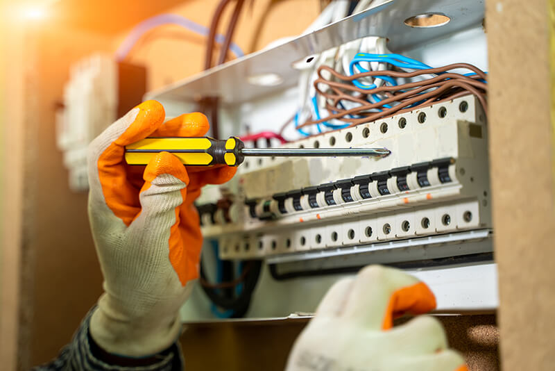 Electrician installing a socket panel